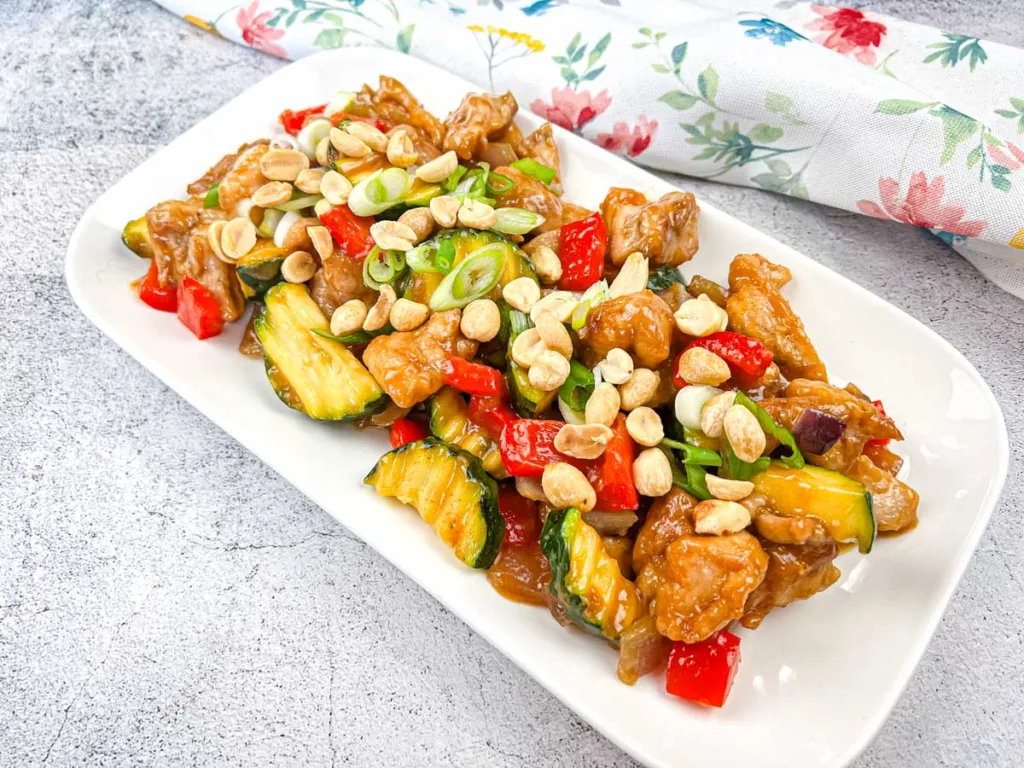 Copycat Panda Express Kung Pao Chicken on a white plate.