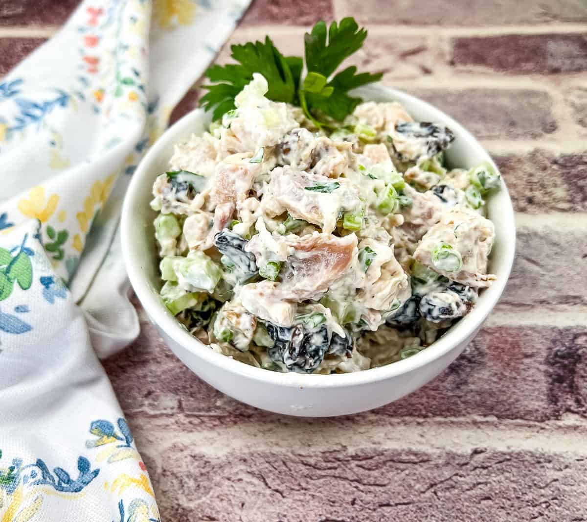 Chicken Salad with Walnuts and Cranberries in a bowl.