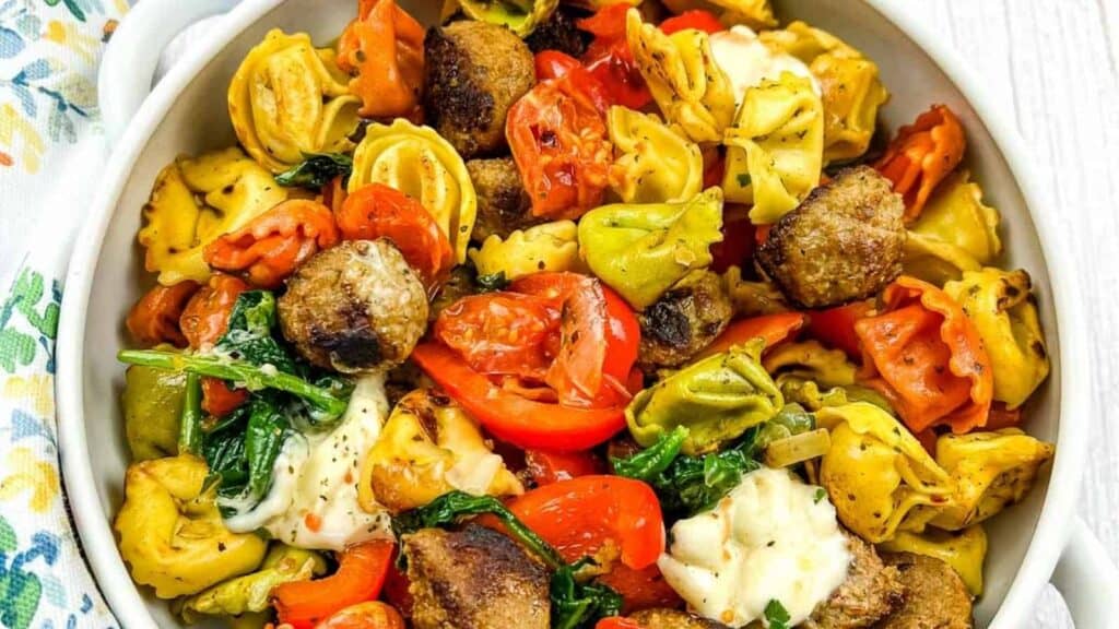 Blackstone Tortellini with Meatballs in a white bowl.