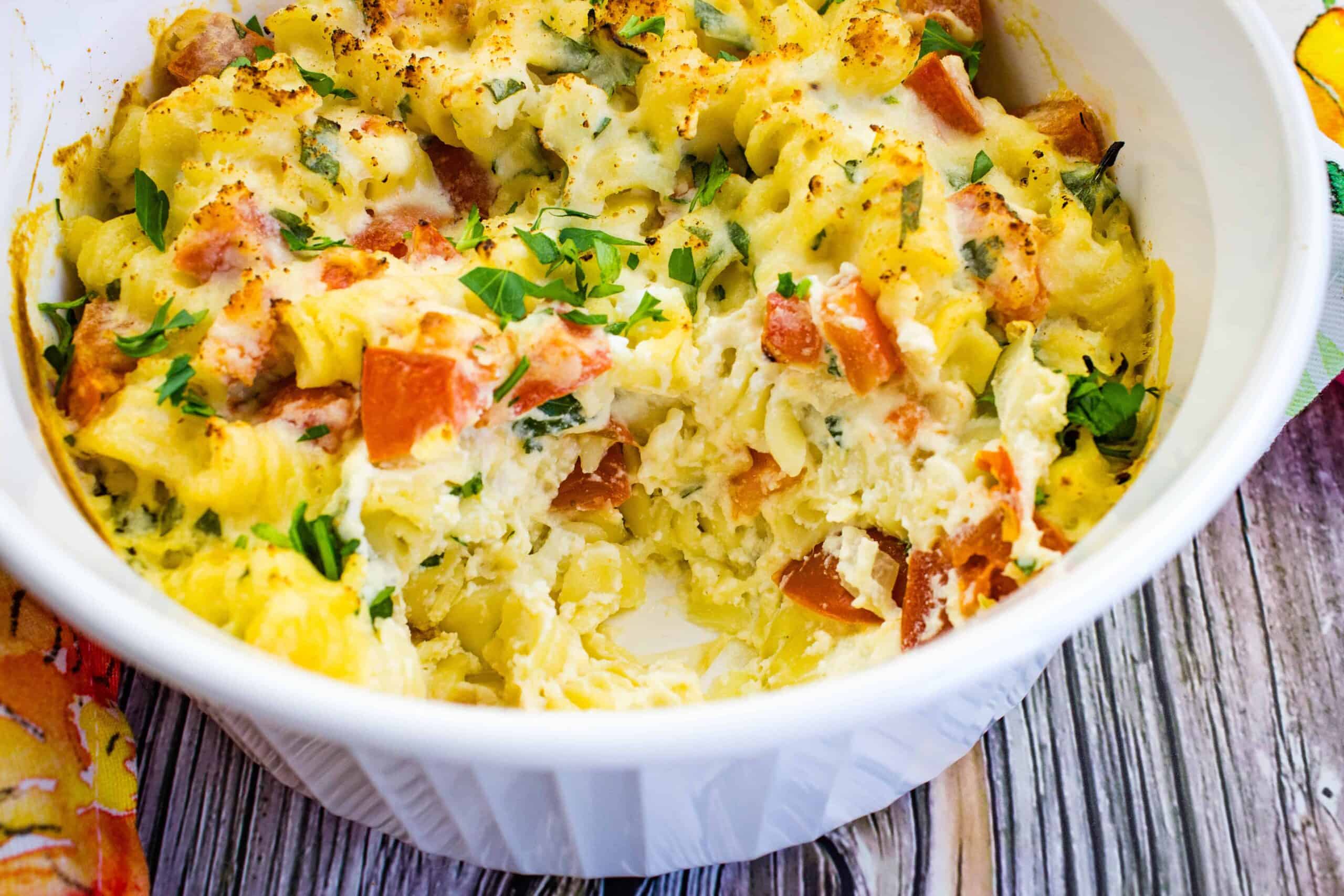 Ricotta and Tomato Pasta in a white bowl.