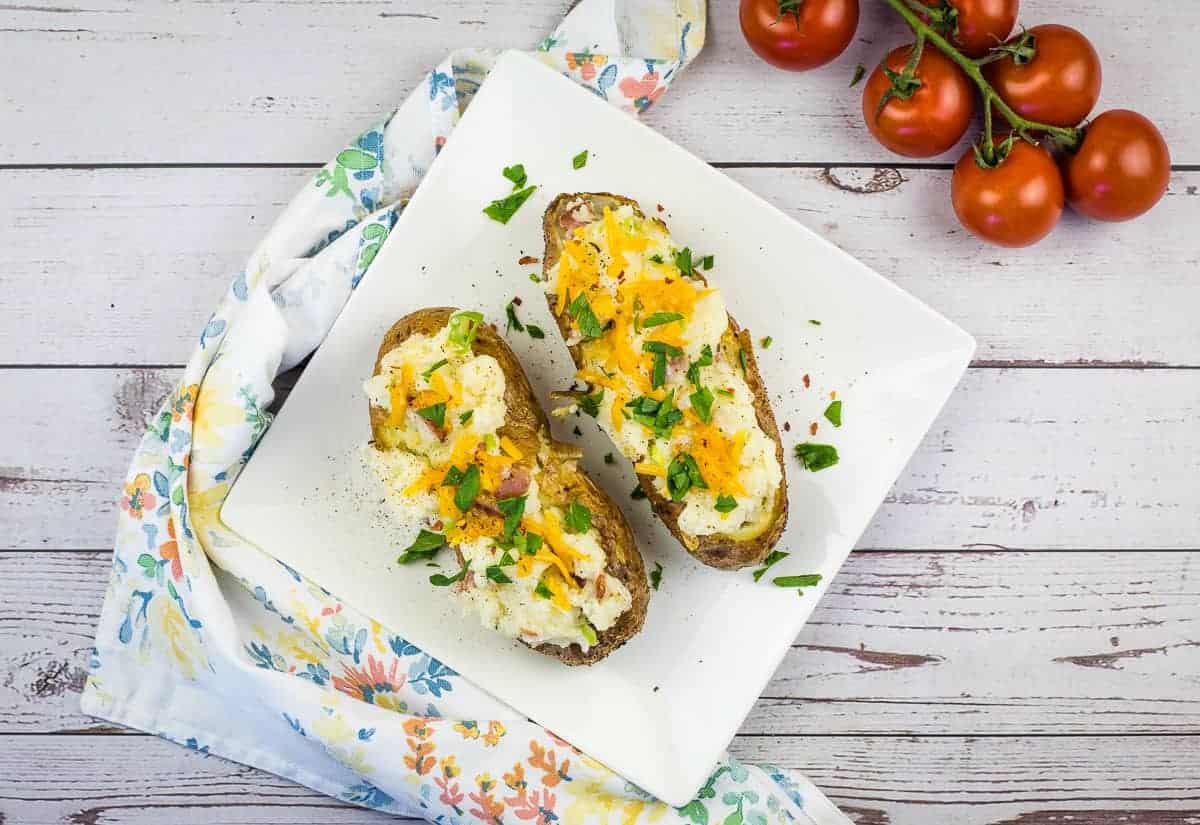 Smoked Double Stuffed Potatoes on a square plate.