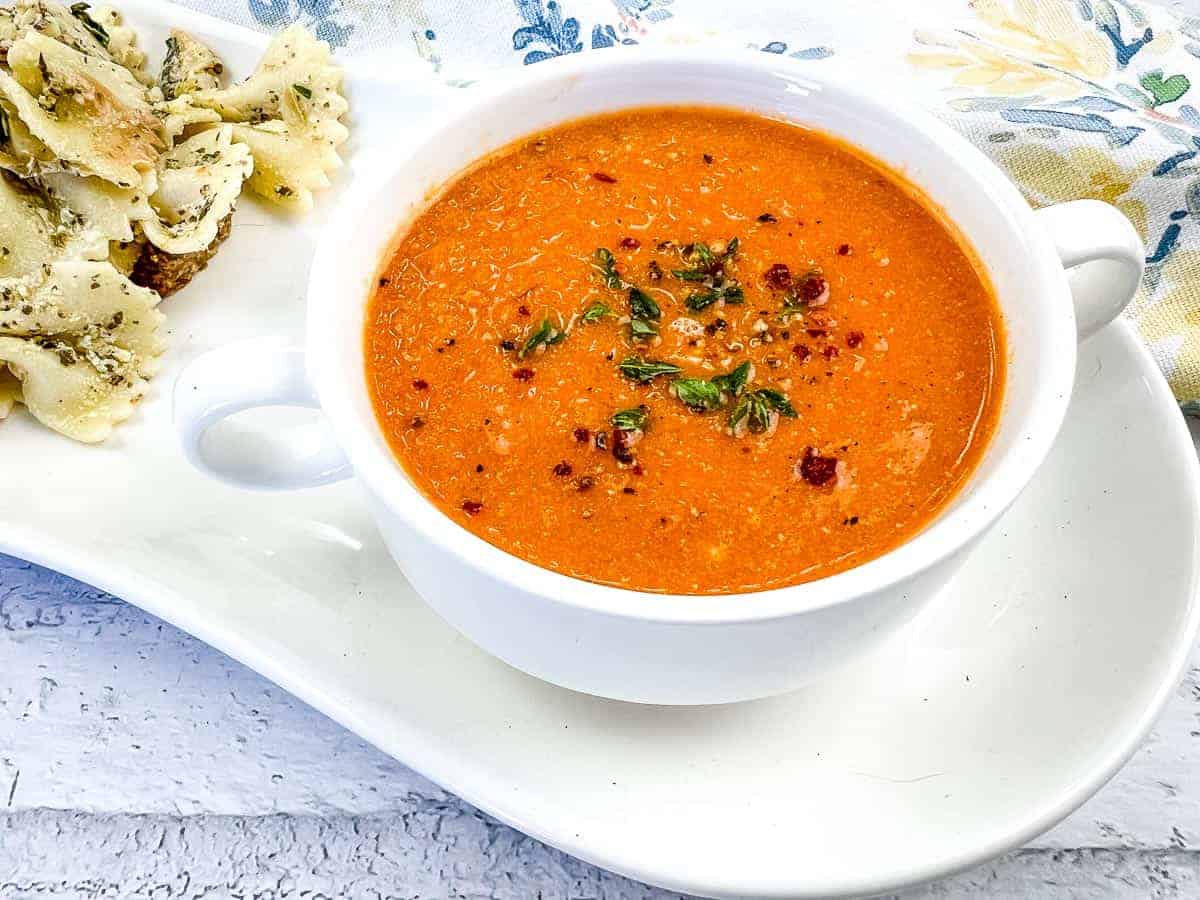 A bowl of Smoked Tomato Soup with Mascarpone.